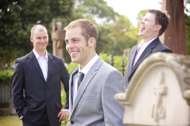 Groom boy band shot in graveyard at church - wedding photography sydney